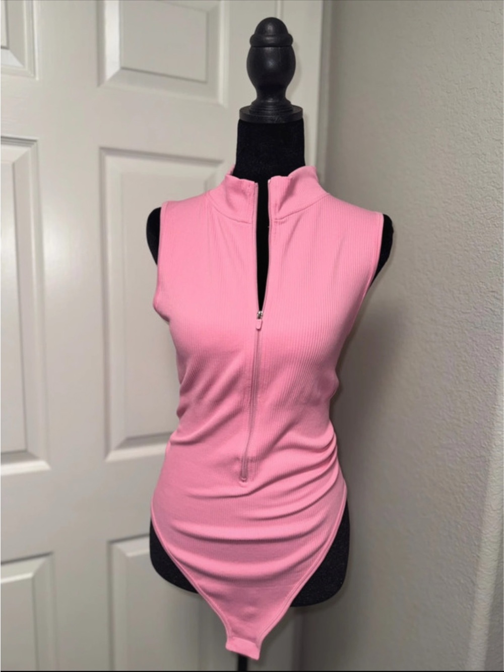 Sleeveless Pink Ribbed Zip-Front Bodysuit